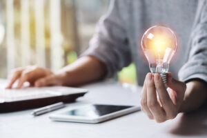 Man holding light bulb