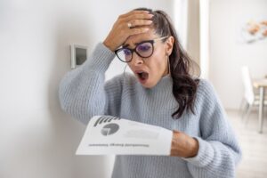 A woman is shocked because of Georgia's power rate increases/ 